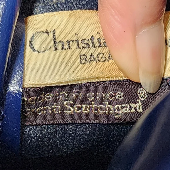 Christian Dior Boston Trotter. Small spots ext. Int dryness NO peeling or sticky